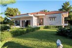 Villa BELLEZZA with a large yard and BBQ.