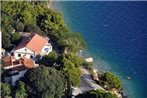 Apartments by the sea Omis - 6003