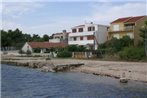 Apartments by the sea Brodarica