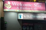 Welcome Stay & Rooftop Cafe