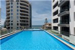 Marvelous Downtown Apartment Moments from Main Beach with Heated Pool