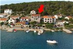 Apartments by the sea Tisno