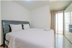 Cozy and Minimalist 2BR Green Bay Condominium Apartment By Travelio