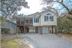 Pet friendly home with a large fenced-in backyard nestled in the heart of Oak Island