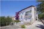 Apartments by the sea Podgora